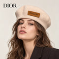 Dior hat worn by a female model, showing the hat shape and detailing.