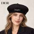 Dior hat worn by a female model, showing the hat shape and detailing.