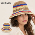 CHANEL bucket hat worn by a female model, with product detail inset.
