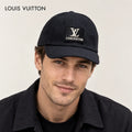 Louis Vuitton hat worn by a male model, showing the hat shape and detailing.