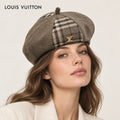 Louis Vuitton hat worn by a female model, showing the hat shape and detailing.