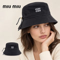 miu miu bucket hat worn by a female model, with product detail inset.