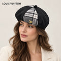 Louis Vuitton hat worn by a female model, showing the hat shape and detailing.
