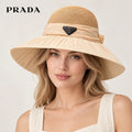 Prada hat worn by a female model, showing the hat shape and detailing.