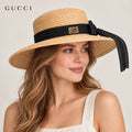 Gucci hat worn by a female model, showing the hat shape and detailing.