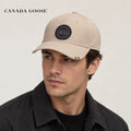 Canada Goose hat worn by a male model, showing the hat shape and detailing.