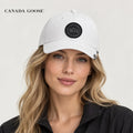 Canada Goose hat worn by a female model, showing the hat shape and detailing.