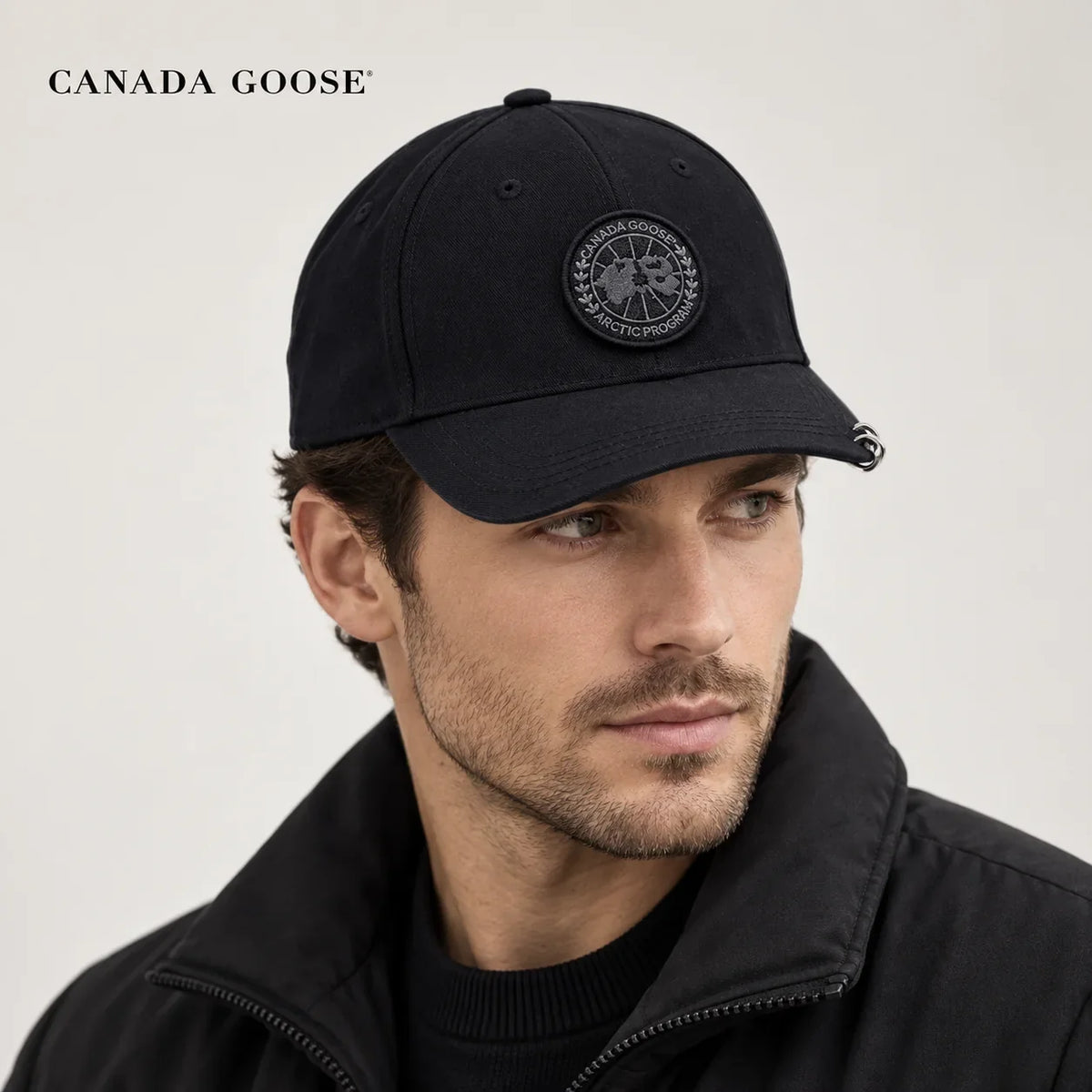 Canada Goose hat worn by a male model, showing the hat shape and detailing.