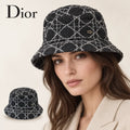 Dior bucket hat worn by a female model, with product detail inset.