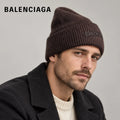 Balenciaga ribbed knit beanie worn by an adult male model