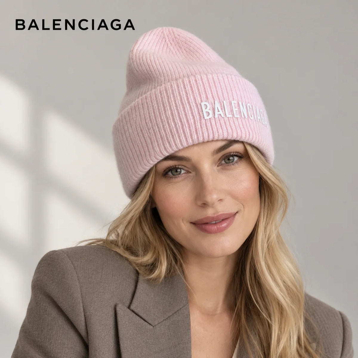Balenciaga ribbed knit beanie worn by an adult female model