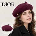 Dior beret worn by an adult female model, with product detail inset.