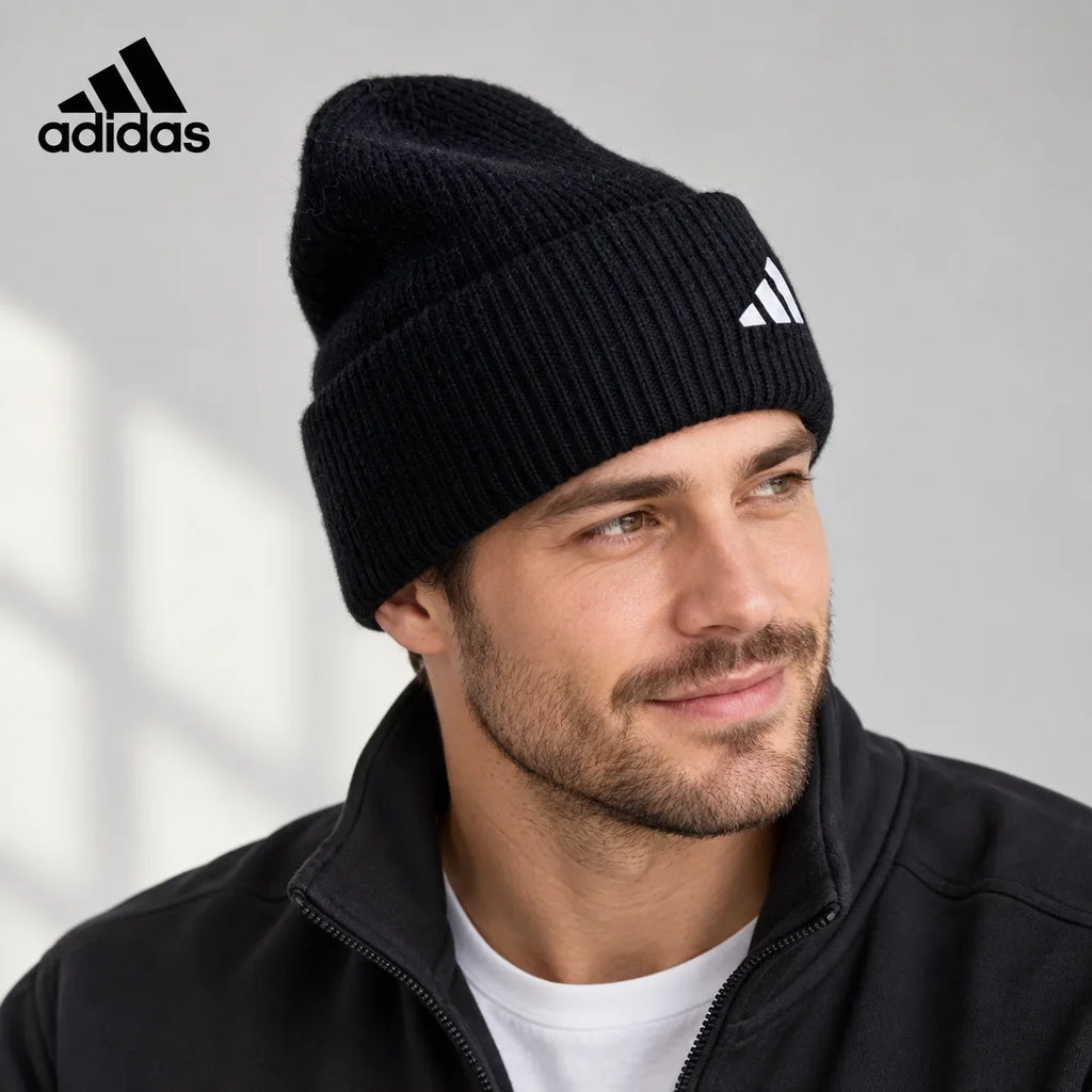 Adidas ribbed knit beanie worn by an adult male model