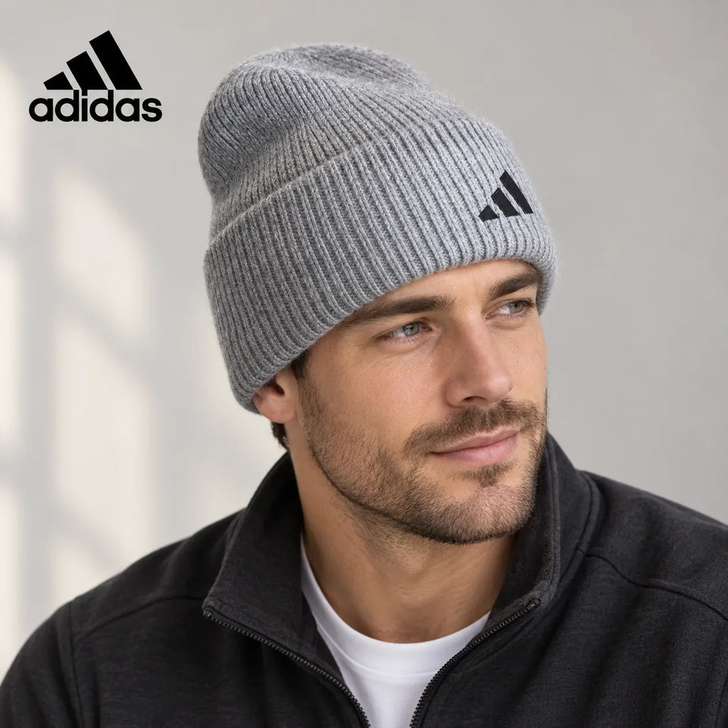 Adidas ribbed knit beanie worn by an adult male model