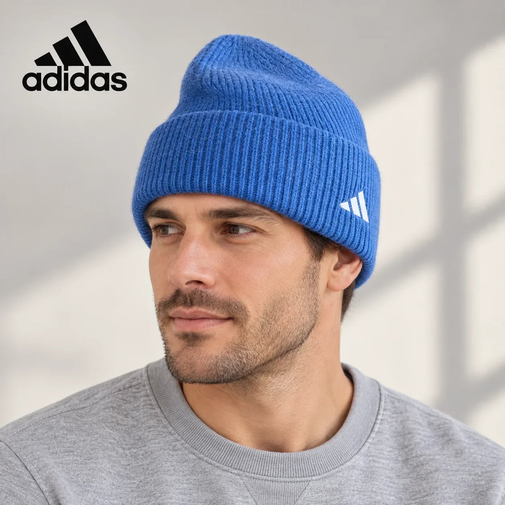 Adidas ribbed knit beanie worn by an adult male model