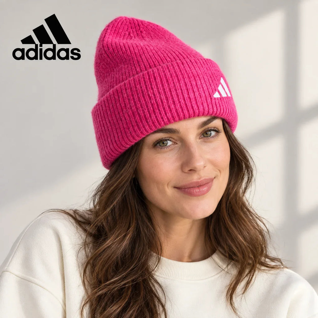 Adidas ribbed knit beanie worn by an adult female model