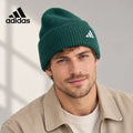 Adidas ribbed knit beanie worn by an adult male model