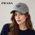 Prada baseball cap worn by an adult female model
