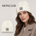 Moncler beanie worn by an adult female model, with product detail inset.