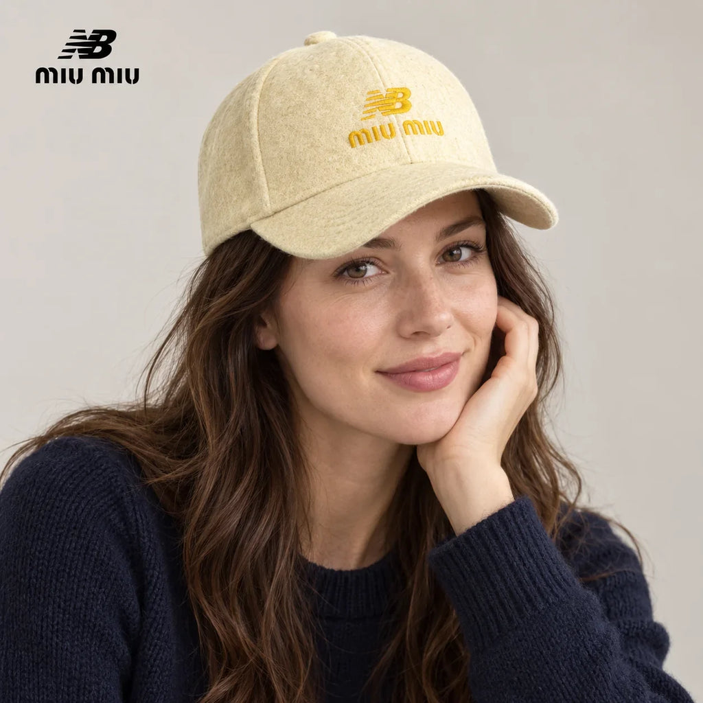 NB / miu miu baseball cap worn by an adult female model