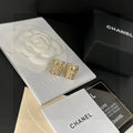 Chanel Interlocking C Stud Earrings - album image 1