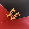 Saint Laurent Gold-Tone Crystal Monogram Stud Earrings - album image 1