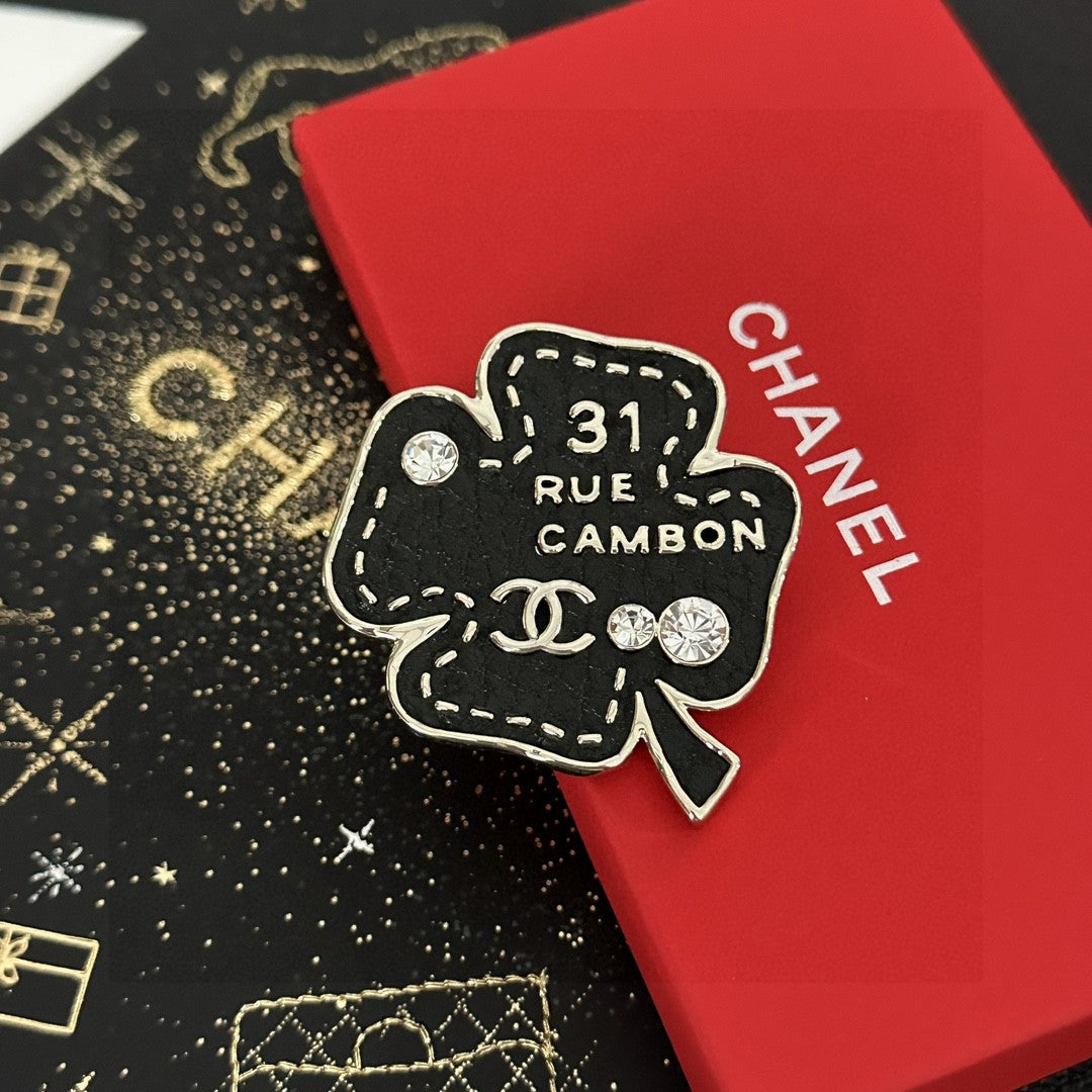 Chanel Black Clover Address Brooch - album image 1