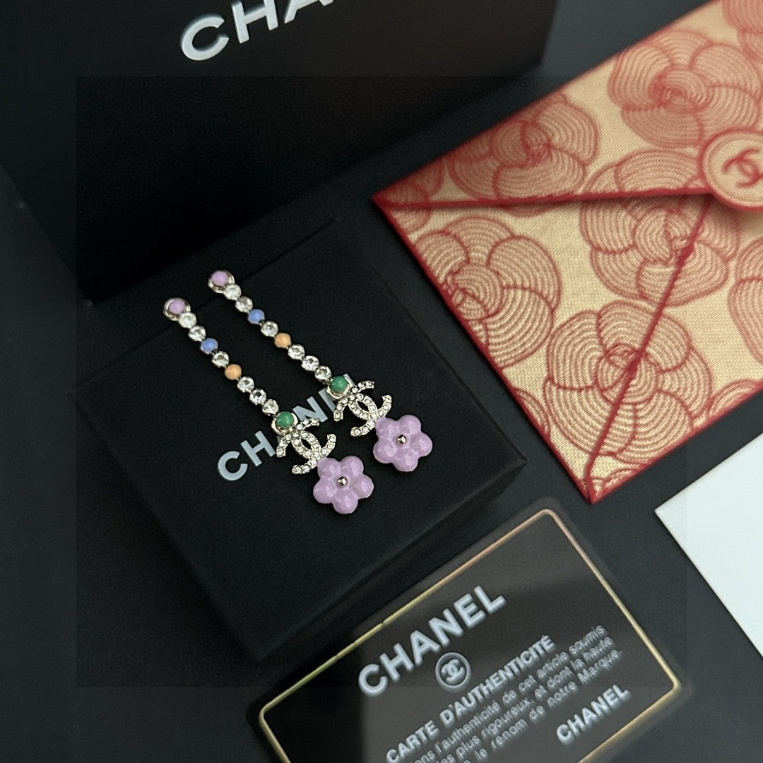 Chanel Interlocking C Stud Earrings - album image 1