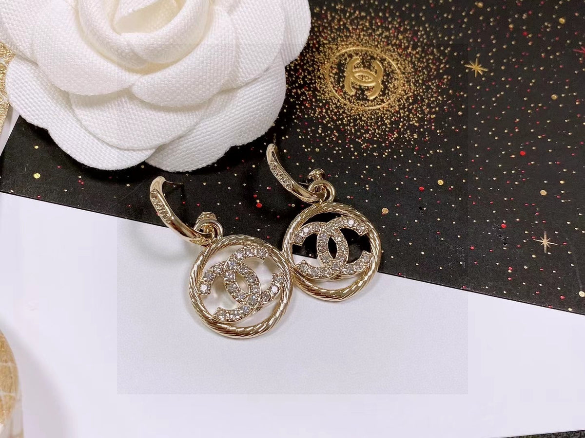 Chanel Interlocking C Stud Earrings - album image 1