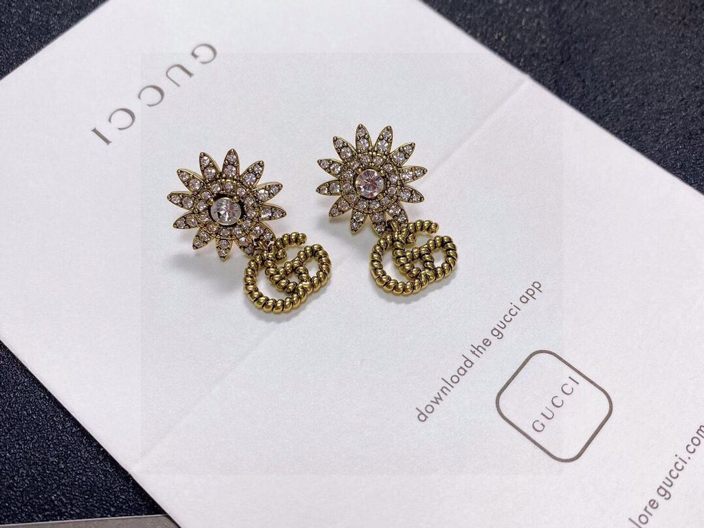 Gucci Gold-Tone Sunburst and GG Drop Earrings - album image 5