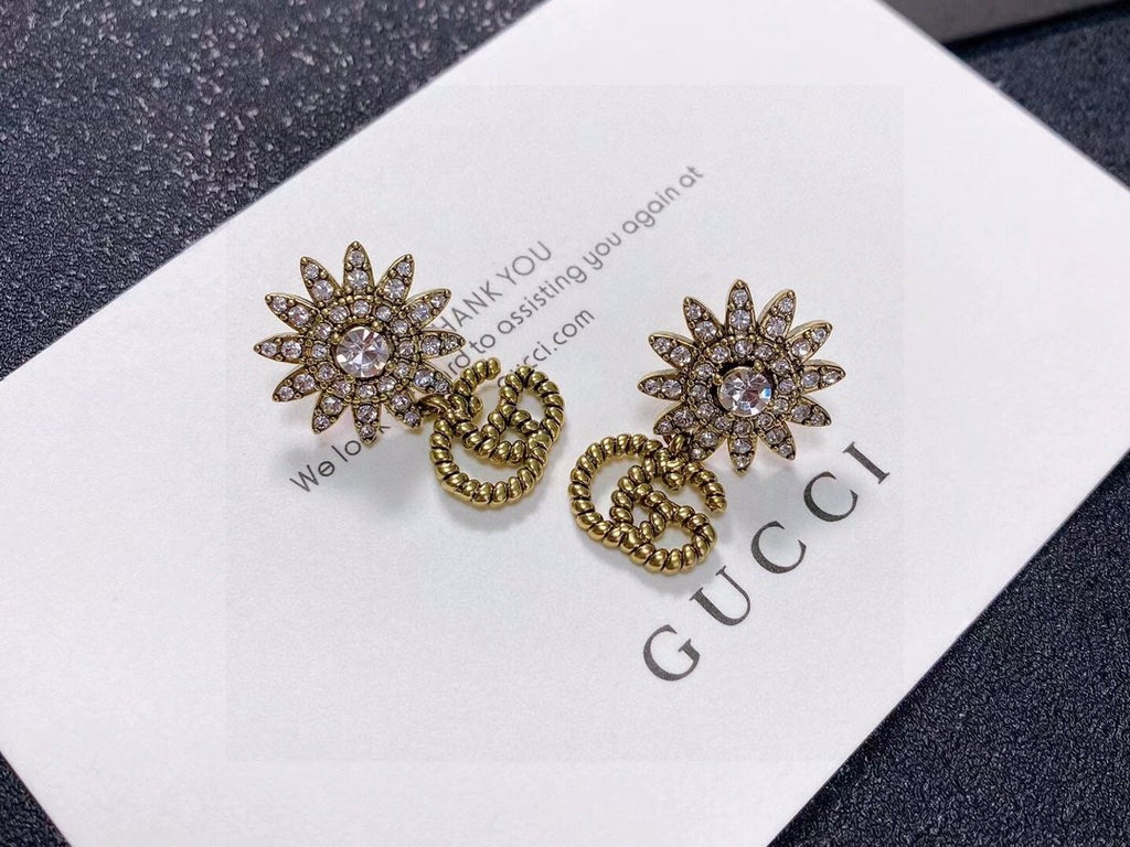 Gucci Gold-Tone Sunburst and GG Drop Earrings - album image 2