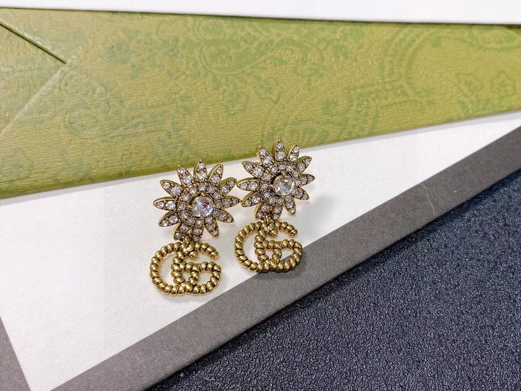 Gucci Gold-Tone Sunburst and GG Drop Earrings - album image 4