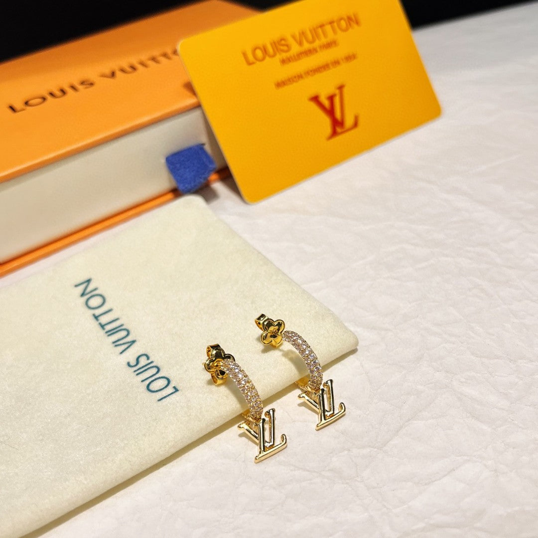 Louis Vuitton Monogram LV Letter Tassel Earrings - album image 9