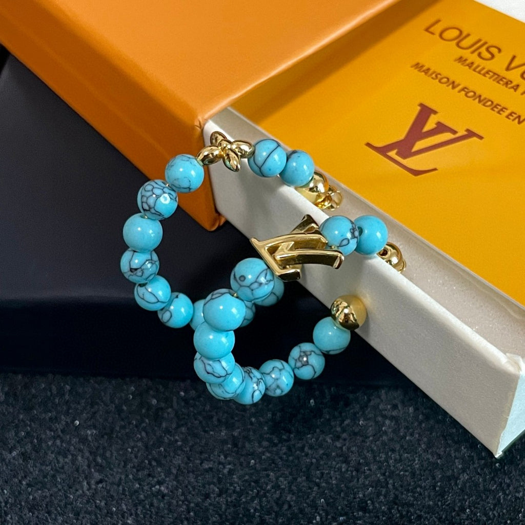 Louis Vuitton Clover LV Letter Earrings - album image 6