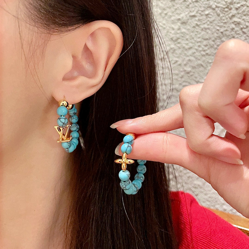 Louis Vuitton Clover LV Letter Earrings - album image 3
