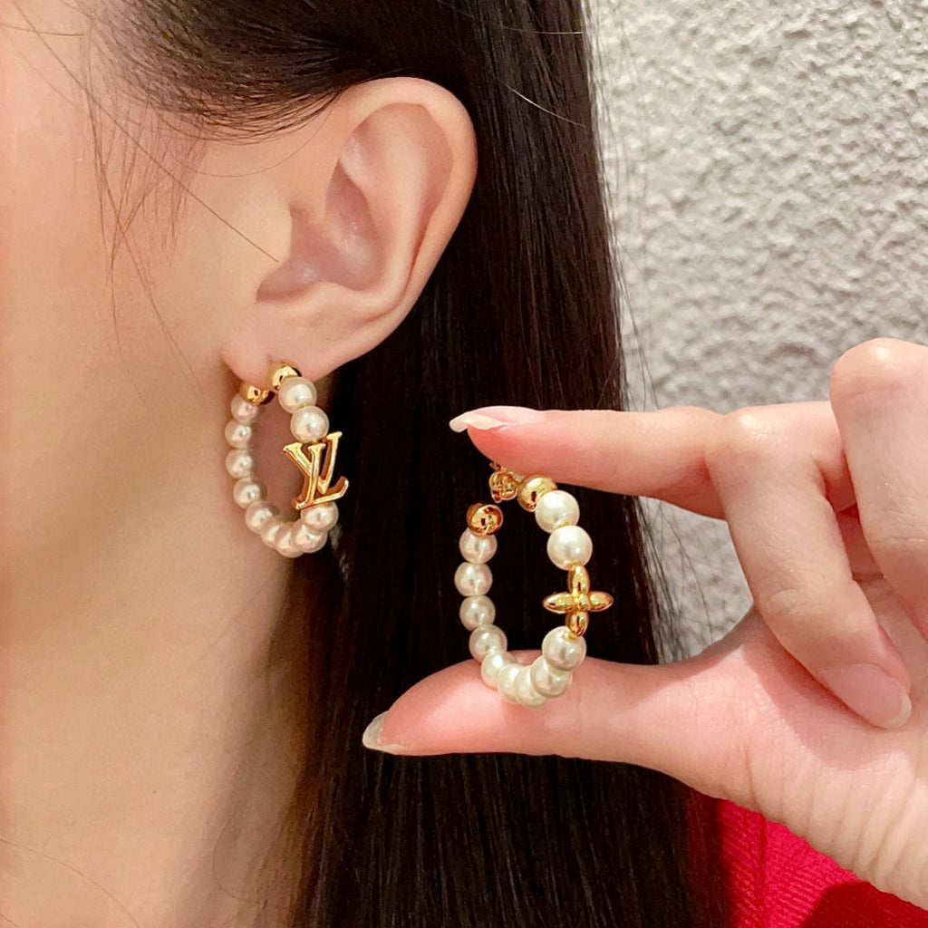 Louis Vuitton Clover LV Letter Earrings - album image 1