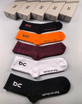 On orange burgundy crew socks - main image