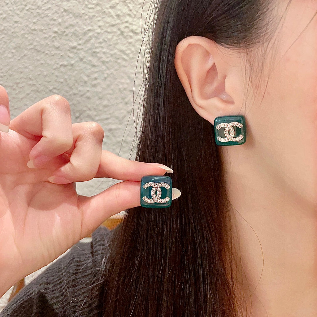 Chanel Interlocking C Crystal Accent Stud Earrings - album image 1