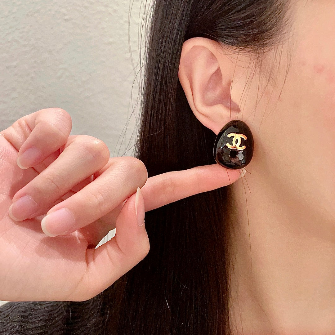 Chanel Interlocking C Stud Earrings - album image 2