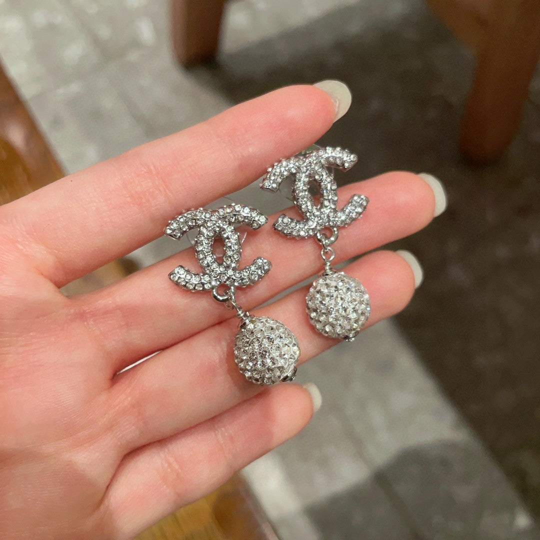 Chanel Interlocking C Crystal Accent Earrings - album image 4