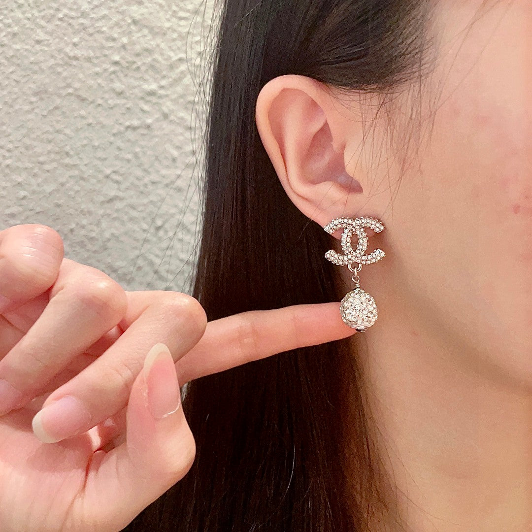 Chanel Interlocking C Crystal Accent Earrings - album image 2