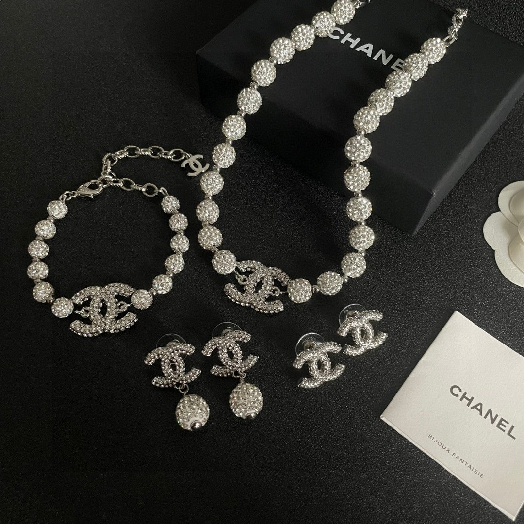 Chanel Interlocking C Crystal Accent Earrings - album image 10