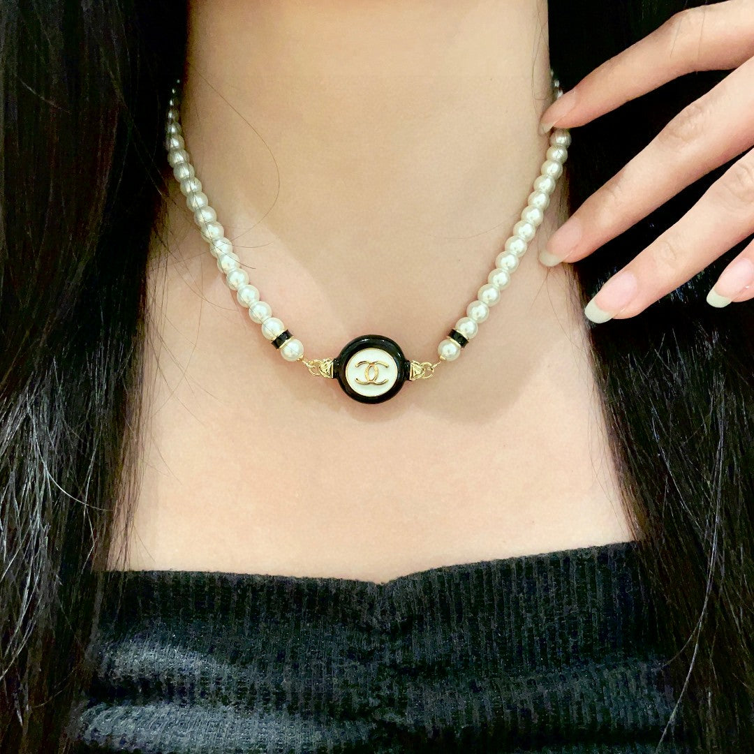 Chanel Interlocking C Pearl Necklace - album image 2