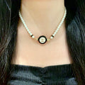 Chanel Interlocking C Pearl Necklace - album image 1