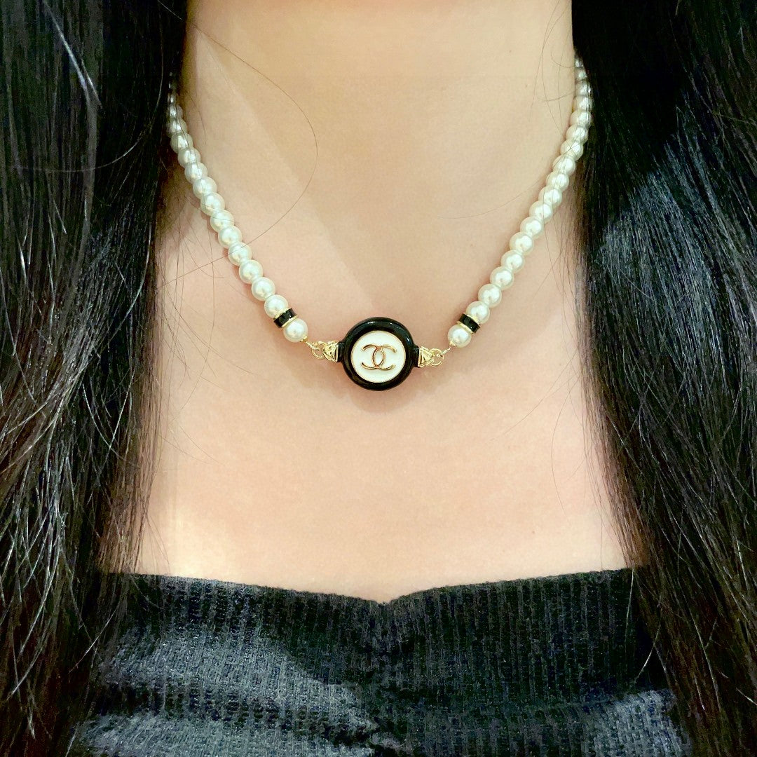 Chanel Interlocking C Pearl Necklace - album image 1