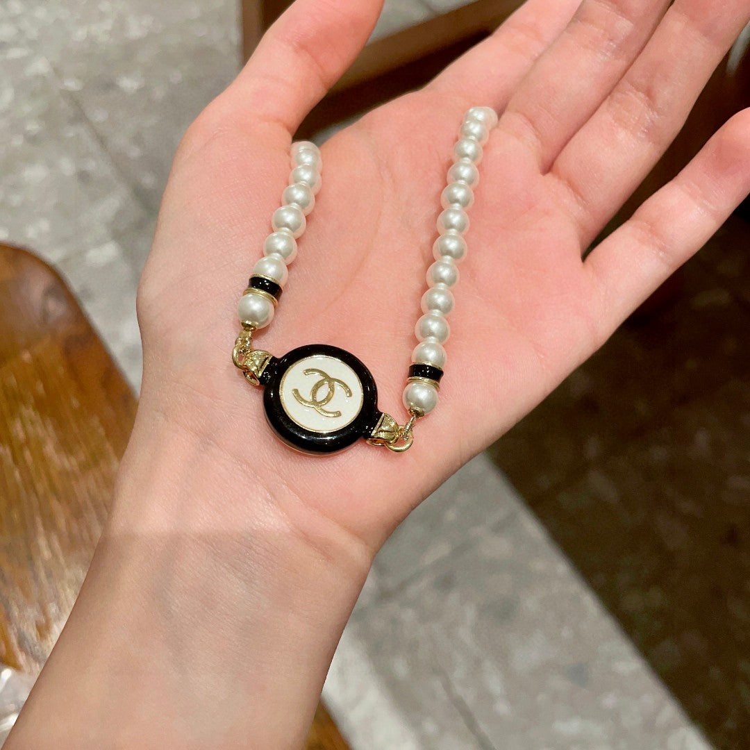 Chanel Interlocking C Pearl Necklace - album image 4