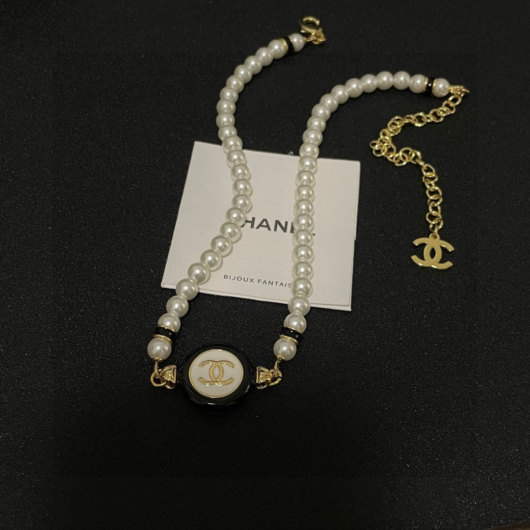 Chanel Interlocking C Pearl Necklace - album image 9