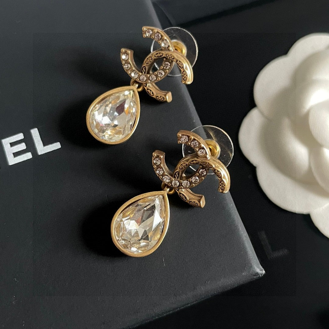 Chanel Interlocking C Crystal Accent Earrings - album image 7