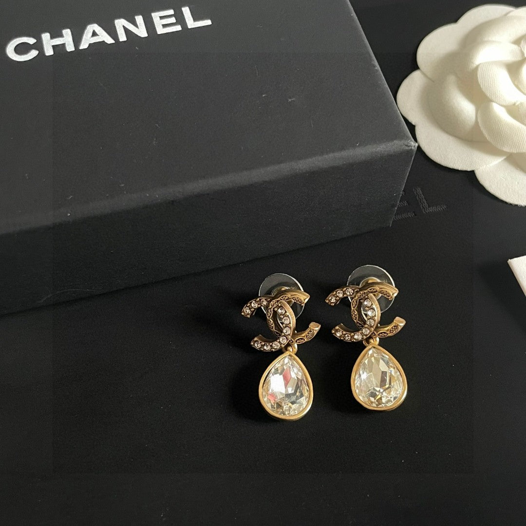 Chanel Interlocking C Crystal Accent Earrings - album image 8