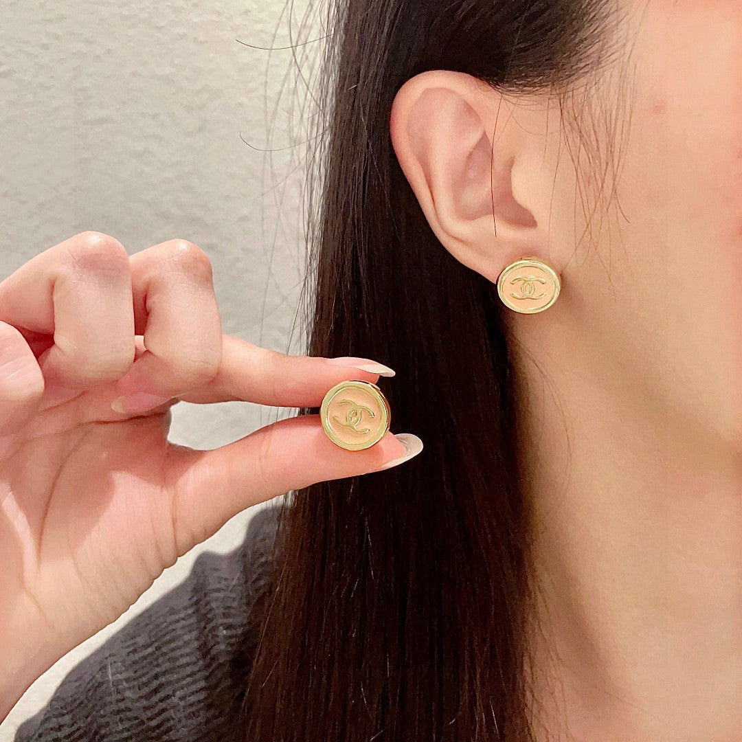 Chanel Interlocking C Circular Stud Earrings - album image 1